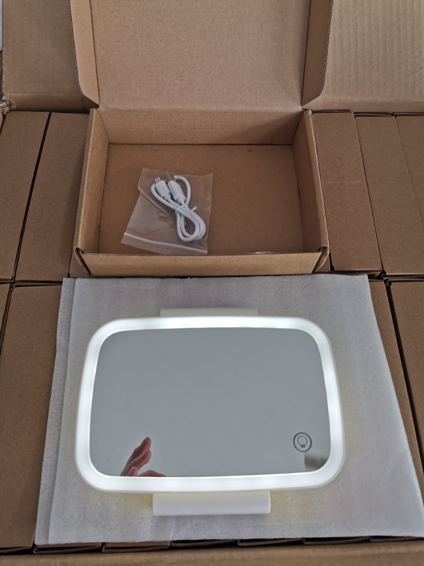 Velorian Collection in-car LED makeup mirror showing illuminated mirror surface for easy application inside a vehicle.