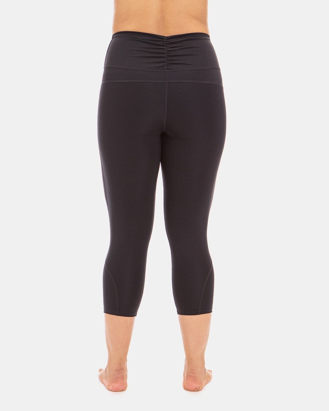 Back view of Handful Squeeze Play High-Waist Capri in Booya Black, featuring a snug fit and high-waist design for active wear.