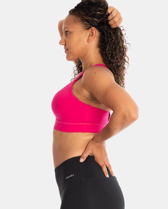 Handful Y-Back Bra in Battle Cry Pink, side view showing supportive design and vibrant pink color.