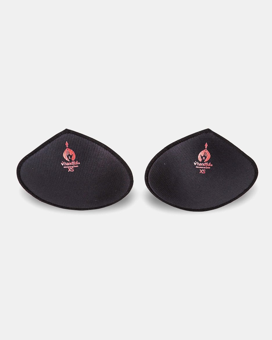 Black Thin Lights Out™ Pads replacement pads from Handful, showing sleek, slim, black pads designed for discreet protection.