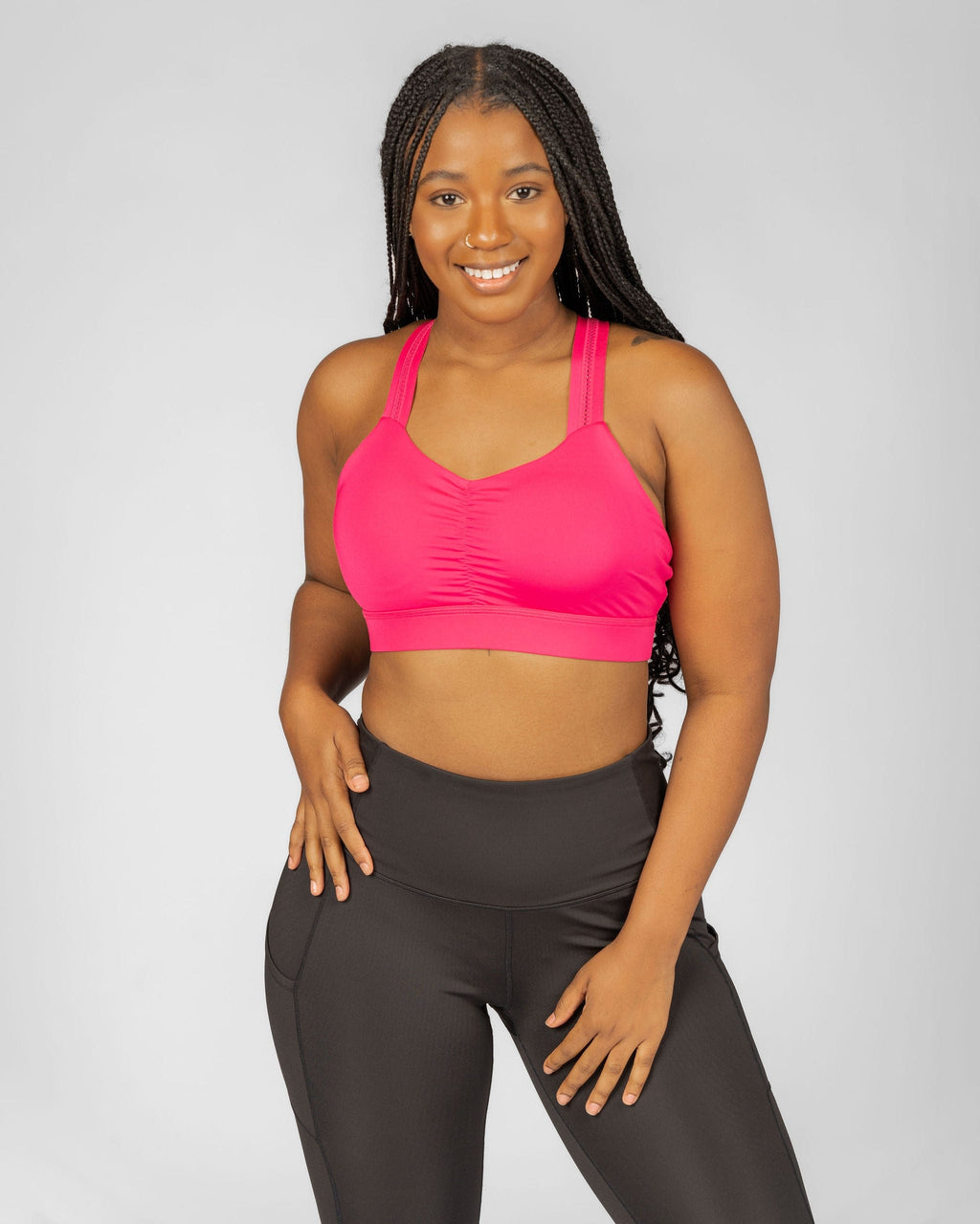 Y-Back Bra in Battle Cry Pink by Handful, showing the supportive design and vibrant pink color on a mannequin.