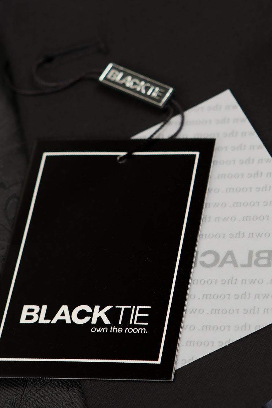 Black Milan Tuxedo Jacket with peak lapels, formal men's tuxedo separate by Tux-USA, shown on a hanger.