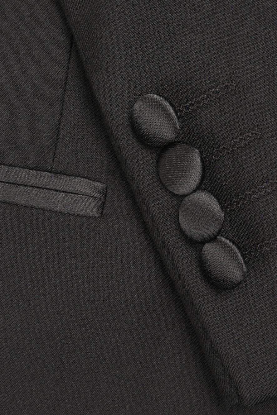 Black Milan Tuxedo Jacket with peak lapels from Tux-USA, shown as a formal men's tuxedo separate.