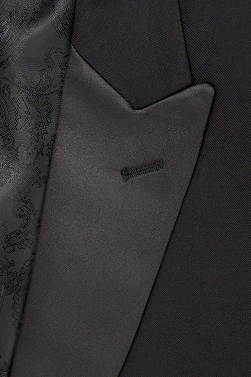 Black Milan Tuxedo Jacket by Tux-USA featuring peak lapels, tailored fit, suitable for formal occasions, shown on a hanger.