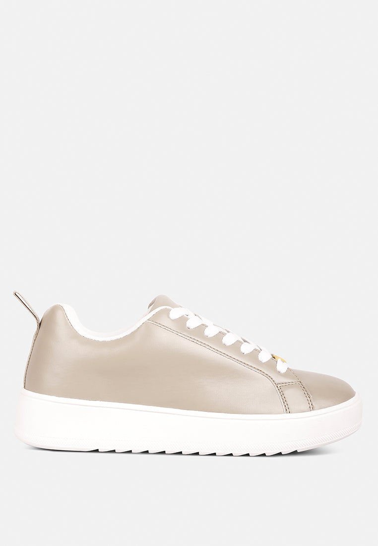 Taupe London Rag Rouxy faux leather sneakers with white rubber soles, lace-up design, and stylish casual footwear.