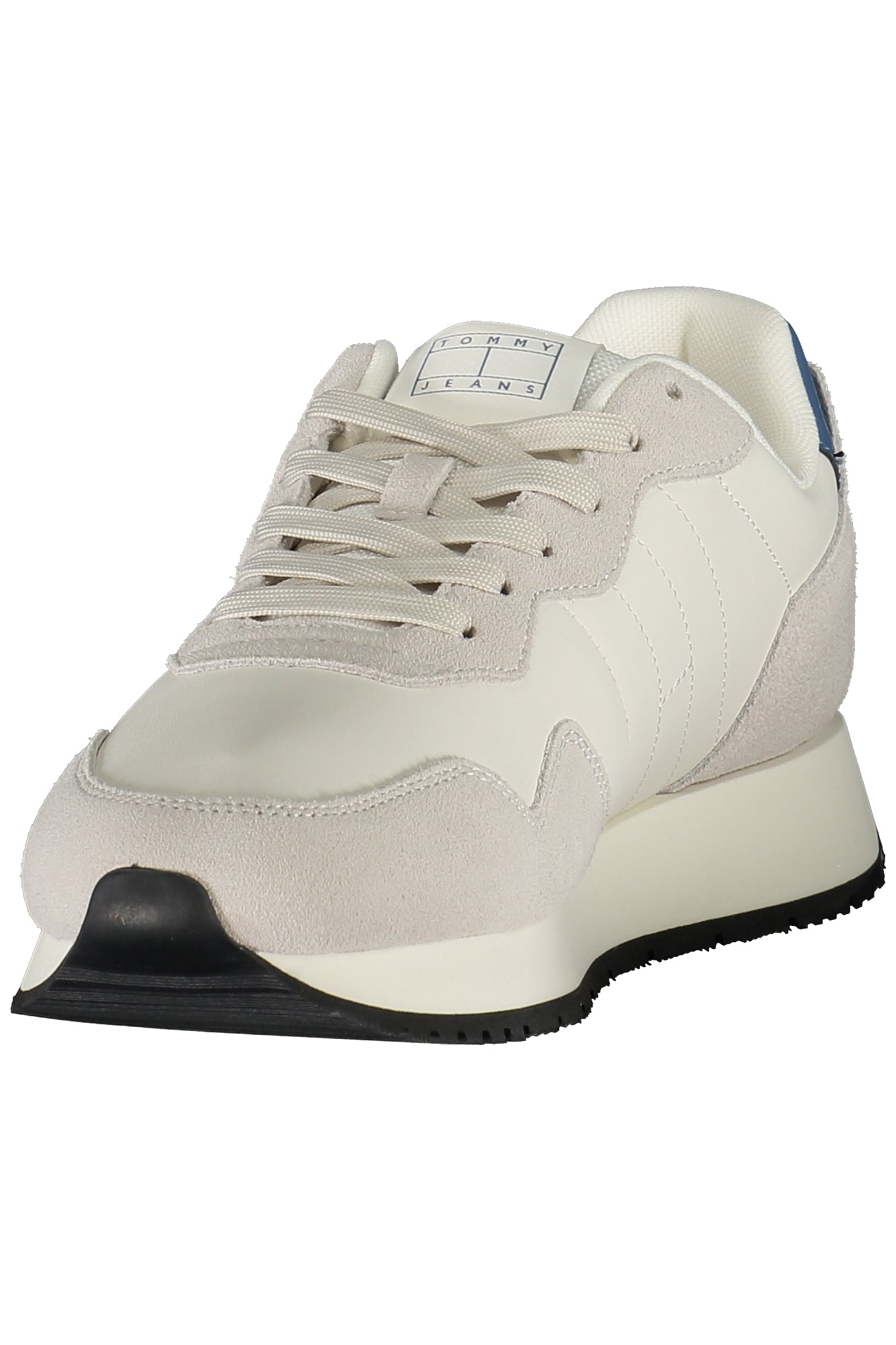 White Tommy Hilfiger men's sports sneakers shown from the side, featuring the brand's logo and sporty design.