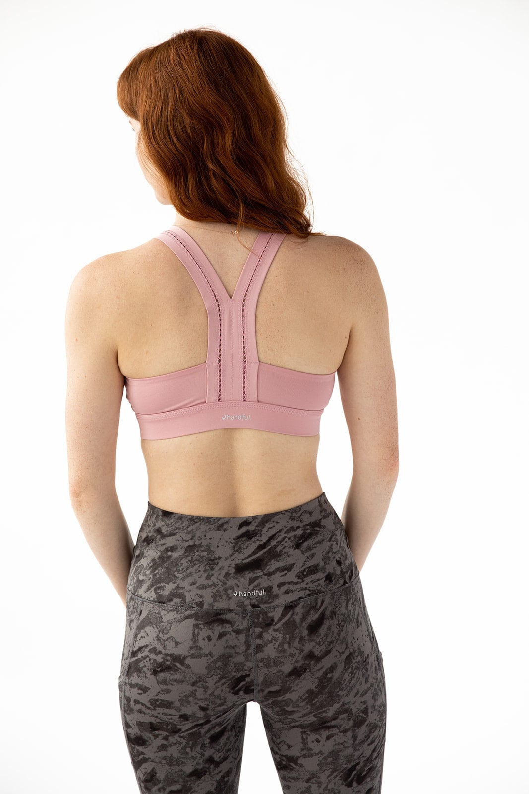 Pink Y-Back bra by Handful featuring a supportive design and comfortable fit, shown on a white background.