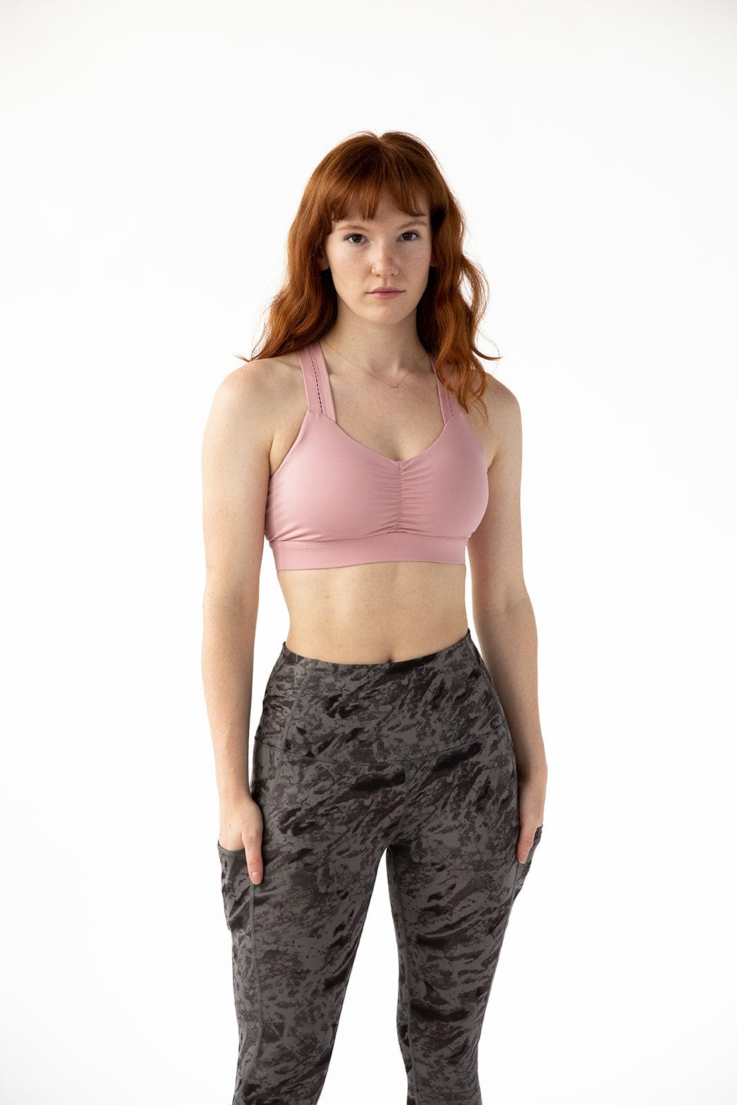 Pink Y-Back bra by Handful with supportive straps and smooth fabric, designed for comfort and style.